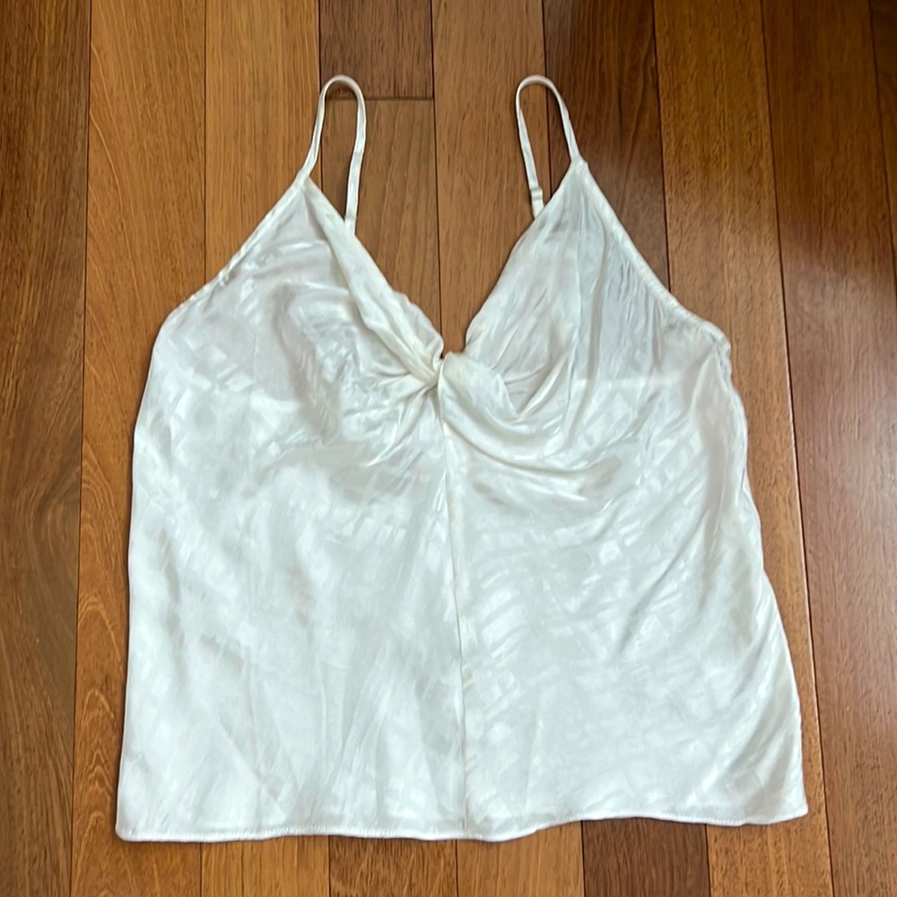 White sauce, silky looking tank top